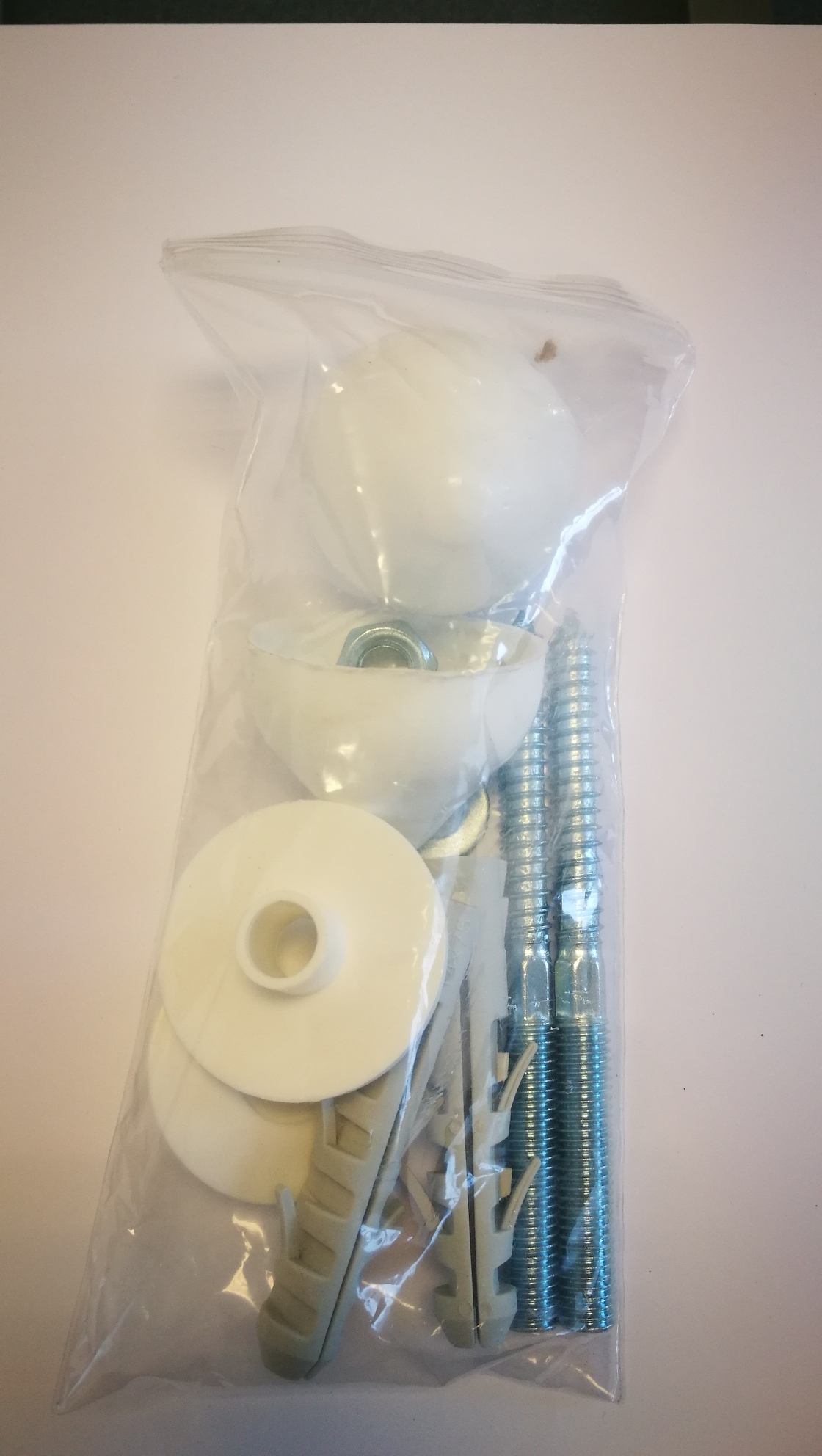 Kotevní šrouby pro pisoár Golem, Livo.